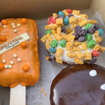 Voodoo Doughnut - The special Universal orange creamsicle flavor, Oh Captain my Captain and Portland cream - Bakeries Near Me - Orlando, Florida