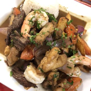 Rincon Criollo Peruvian Grill - Saltado with ribeye, chicken and shrimp $15.95 - Peruvian Near Me - Reseda, California Rincon Criollo Peruvian Grill - Saltado with ribeye, chicken and shrimp $15.95 - Peruvian Near Me - Reseda, California