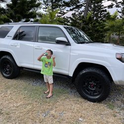 Servco Used Car Center - My son Greyson with his new ride to school.