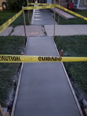 Cement Walkway - This cement walkway was not leveled and cracked, It was removed, leveled. New concrete was poured and customer was beyond content. Project was done in Chicago. Cement Walkway - This cement walkway was not leveled and cracked, It was removed, leveled. New concrete was poured and customer was beyond content. Project was done in Chicago.