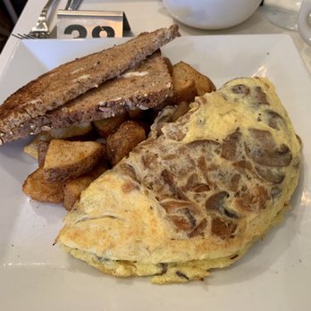 Miles Table - Breakfast Omelet with mushrooms, onion, and provolone - comes with multigrain toast and home fries - American Near Me - Philadelphia, Pennsylvania Miles Table - Breakfast Omelet with mushrooms, onion, and provolone - comes with multigrain toast and home fries - American Near Me - Philadelphia, Pennsylvania
