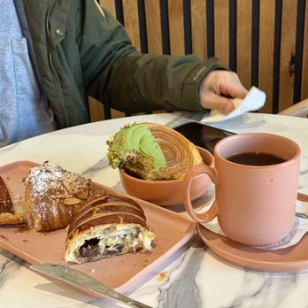 Gourmet Central Bakery - a plate of pastries and a cup of coffee - Coffee & Tea Near Me - Prunedale, California Gourmet Central Bakery - a plate of pastries and a cup of coffee - Coffee & Tea Near Me - Prunedale, California