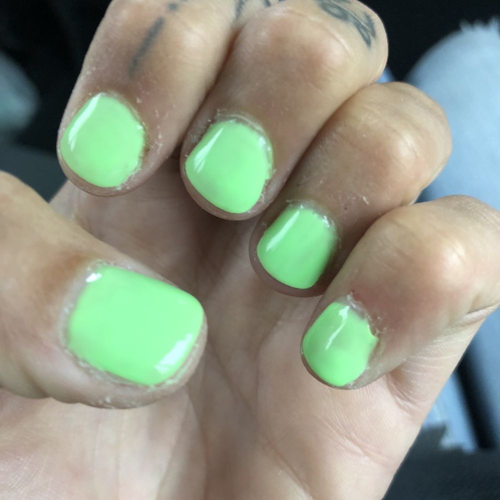 Chewed up cuticle and terrible paint job.