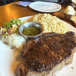 New York Strip* 12 oz. Seasoned Rice Loaded Mashed Potatoes