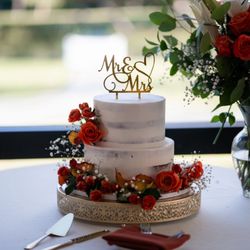 Twice Baked Baking Company - Our wedding cake. Flowers, cake stand, and topper were ours. Cake was by twice baked.