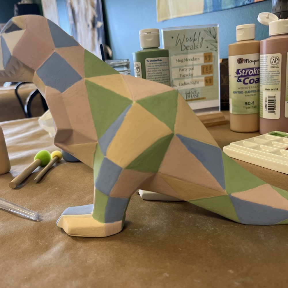 Glaze & Phase - Working on T Rex - Arts & Crafts Near Me - Englewood, Colorado