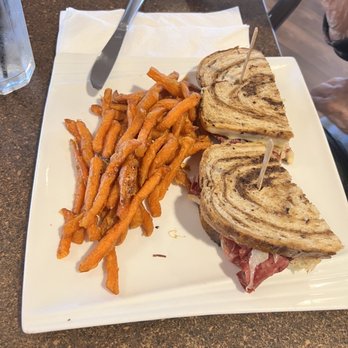 The Views Restaurant - Corned beef Reuben Sandwich with sweet potato fries - American Near Me - Oro Valley, Arizona The Views Restaurant - Corned beef Reuben Sandwich with sweet potato fries - American Near Me - Oro Valley, Arizona