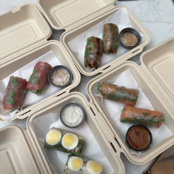 Kaleido Rolls - Left to right, top to bottom: spicy tuna, eggplant, Caesar, and smoked salmon - Salad Near Me - Newport Beach, California Kaleido Rolls - Left to right, top to bottom: spicy tuna, eggplant, Caesar, and smoked salmon - Salad Near Me - Newport Beach, California