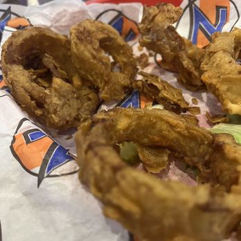 Zipps Sports Grill - Over done onion rings - American Near Me - Chandler, Arizona Zipps Sports Grill - Over done onion rings - American Near Me - Chandler, Arizona