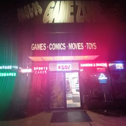 Page 3's Gamezone - Night Front View of Page-3s Game Zone
