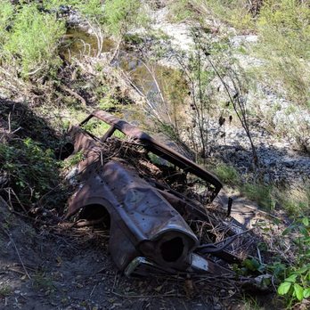 Santa Margarita River Trail - Rusted out car embedded into the earth - Hiking Near Me - Fallbrook, California Santa Margarita River Trail - Rusted out car embedded into the earth - Hiking Near Me - Fallbrook, California