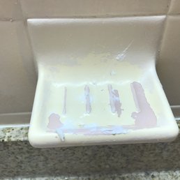 A bathroom that has seen much better days.