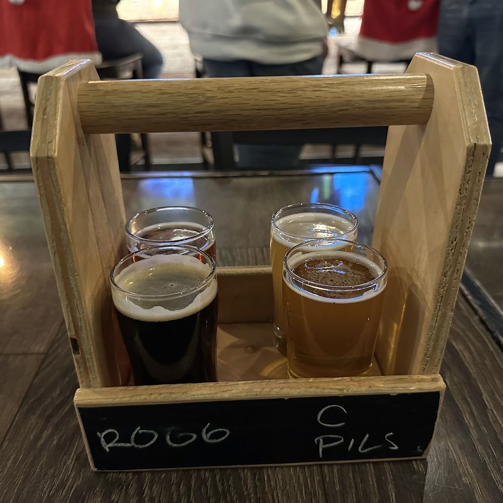 two pints of beer in a wooden crate two pints of beer in a wooden crate