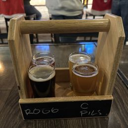 two pints of beer in a wooden crate two pints of beer in a wooden crate