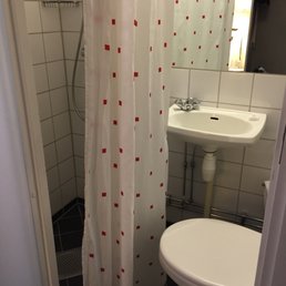 Tiniest bathroom I ever did see.  Everything will get wet after you shower.