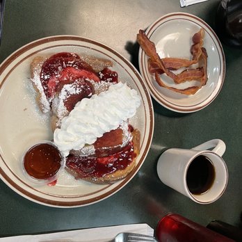 Egg Works - French toast with strawberry team cheese, side of bacon with coffee - Breakfast & Brunch Near Me - Las Vegas, Nevada Egg Works - French toast with strawberry team cheese, side of bacon with coffee - Breakfast & Brunch Near Me - Las Vegas, Nevada