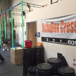 SchuBox Athletics - Weight stack, logo and ring muscle up stations