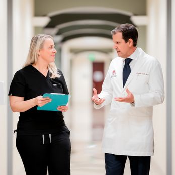 Andrew Smith, MD, FACS - Dr. Smith and Office Manager - Cosmetic Surgeons Near Me - Irvine, California Andrew Smith, MD, FACS - Dr. Smith and Office Manager - Cosmetic Surgeons Near Me - Irvine, California