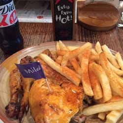 Nandos - 1/2 roasted chicken (Mild spiced) with peri peri fries