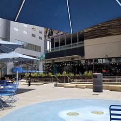 CityScape - Phoenix - Sitting at umbrella shaded tables in center area