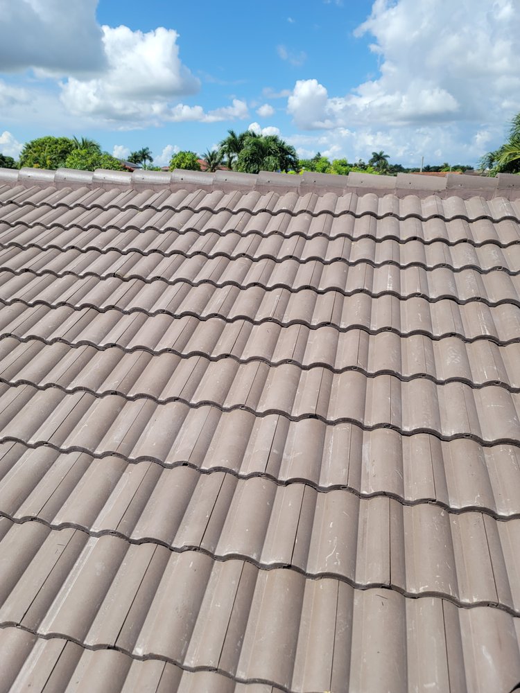 Slide of JMR Roofing Services