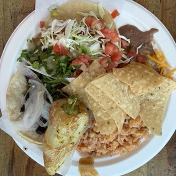 Holé Molé - mini surf & turf plate: 1 baja fish taco, 1 smoked brisket taco with rice & beans = $7.95 - Mexican Near Me - Long Beach, California Holé Molé - mini surf & turf plate: 1 baja fish taco, 1 smoked brisket taco with rice & beans = $7.95 - Mexican Near Me - Long Beach, California