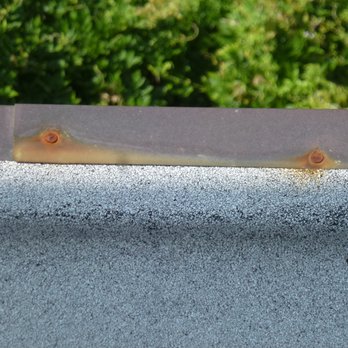 Premier Roofing Company - When one installs copper flashing, the nails are supposed to also be copper. Not done so here. - Roofing Near Me - Brooklyn, New York