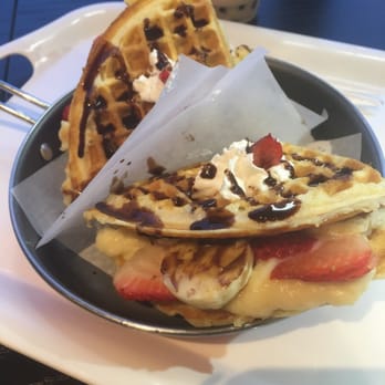 Cafe Orange - Nutella waffle with bananas, strawberries and a custard spread. Served in a Super cute frying pan! Yum! - Desserts Near Me - Garden Grove, California