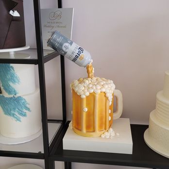 Lily's Cakes - a man pouring a beer into a cake - Bakeries Near Me - Harker Heights, Texas