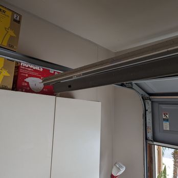 Garage Door Giant - Garage door jammed and came off the tracks - Bryce fixed it within 5 minutes - Garage Door Services Near Me