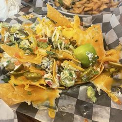 Eat Foodies - Nachos with no blackened chicken to be found and unmelted cheese.