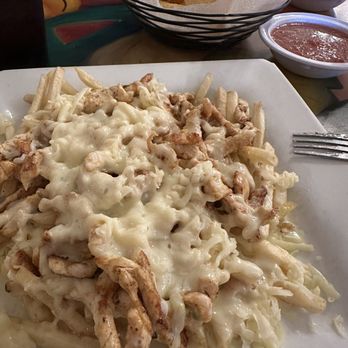 La Pachanga Mexican Restaurant - Mexican Fries - Fries smothered in chicken and queso. - Mexican Near Me - Herculaneum, Missouri La Pachanga Mexican Restaurant - Mexican Fries - Fries smothered in chicken and queso. - Mexican Near Me - Herculaneum, Missouri