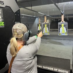 The Range St. Louis West - Shooting bay trying a smaller semi-auto handgun during a Girls & Guns event. How fun are the targets?! So cool!