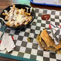 Burger and 'loaded' fries. Skip the up charge the fries were decent ranch not so much Burger and 'loaded' fries. Skip the up charge the fries were decent ranch not so much