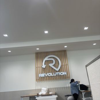 Revolution Laundry - Logo/ Sign inside - Dry Cleaning Near Me - Seattle, Washington Revolution Laundry - Logo/ Sign inside - Dry Cleaning Near Me - Seattle, Washington