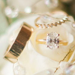 Adele Diamond - Diamond engagement ring and gold wedding bands purchased from Rand at Adele