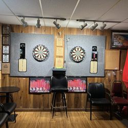 Jim's Neighborhood Lounge - Darts setup with tablet holders, out charts and great lighting.