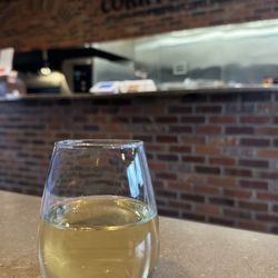 Corky's Pizza - A glass of Wine.