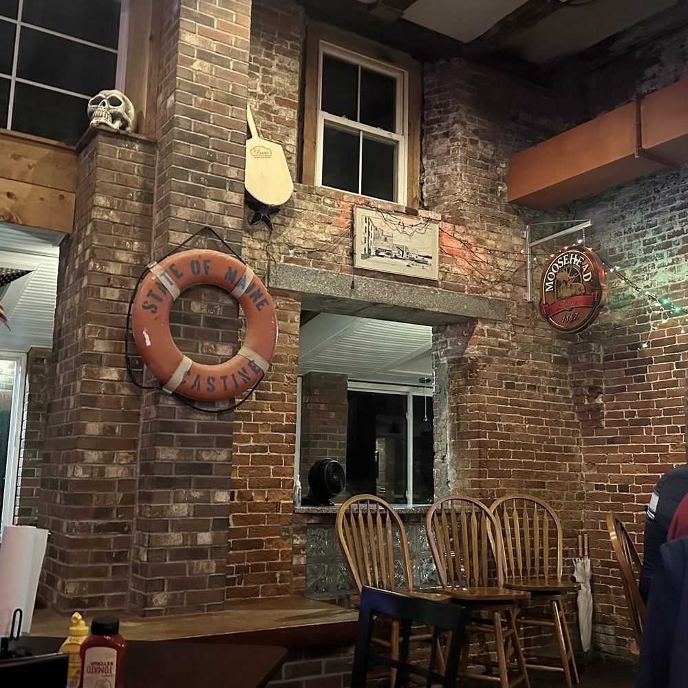Danny Murphy's - a brick wall in a restaurant - Pubs Near Me - Castine, Maine