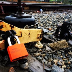 The Green Project - Rail spur is padlocked Cars come in; cargo goes out Track out of service #NOLA_Haiku #GreenProject #NOLA #Trains #MadeInUSA