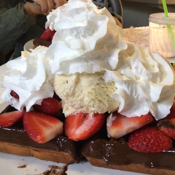 More Than Waffles - Love Waffle. Yes it's that big!! It has waffle dipped in chocolate, fresh strawberries, ice cream and whipped cream. Pretty decadent! - Breakfast & Brunch Near Me - Encino, California More Than Waffles - Love Waffle. Yes it's that big!! It has waffle dipped in chocolate, fresh strawberries, ice cream and whipped cream. Pretty decadent! - Breakfast & Brunch Near Me - Encino, California