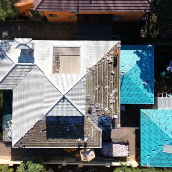 RoofPro Roofing - Converting a tile roof to standing seam metal roofing system. - Roofing Near Me - North Port, Florida RoofPro Roofing - Converting a tile roof to standing seam metal roofing system. - Roofing Near Me - North Port, Florida