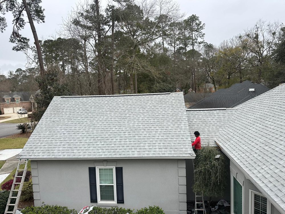 Slide of Palma's Roofing Experts