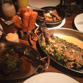 Blue Duck Tavern - Braised beef rib, wood oven roasted whole fish, hand cut BDT fries, and honey roasted carrots - New American Near Me - Washington, DC, District of Columbia
