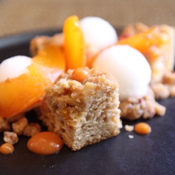 Husk - Brown butter peach cake with champagne sorbet - American Near Me - Charleston, South Carolina Husk - Brown butter peach cake with champagne sorbet - American Near Me - Charleston, South Carolina