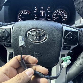 Cartronics - Left under the center console directly next to the gear shifter. Stupidity at its finest. - Car Stereo Installation Near Me - Miami, Florida
