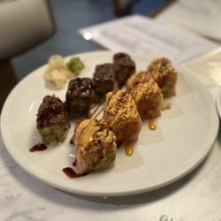 Moonga Asian Bistro - L: Black Angel Roll, R: Titanic Roll
