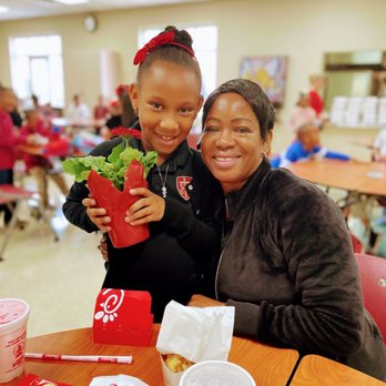 Chick-fil-A - Me and My Beautiful Granddaughter. She love  Chick-fil-A. We are at St. George Independent Elementary School. - Fast Food Near Me - Southaven, Mississippi