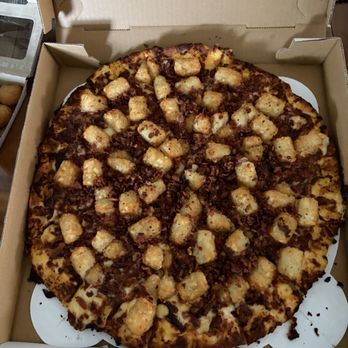 The Porch - Bacon, tots, and cheddar cheese sauce: a crime against pizza; absolutely delicious - Pizza Near Me - Prairie du Chien, Wisconsin The Porch - Bacon, tots, and cheddar cheese sauce: a crime against pizza; absolutely delicious - Pizza Near Me - Prairie du Chien, Wisconsin