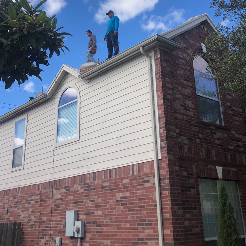 Slide of Top Shield Roofing